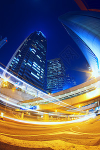 城市之夜多彩 车的灯光在香港模糊市中心地球驾驶景观建筑辉光运动蓝色线条速度图片