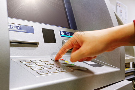 按 ATM 键盘上的取消按钮款机别针出纳员安全数字软垫信用钥匙商业机器图片