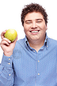 抱着苹果的胖胖男人食物享受微笑男性味道水果背景图片