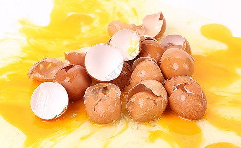 碎蛋壳紧闭运动早餐白色椭圆形黄色棕色事故家禽背景图片