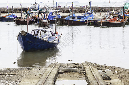 泰海地区渔村船只木头海洋蓝色海浪旅行钓鱼运输海岸线天空图片