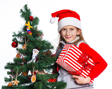 女孩装饰圣诞树微笑女性喜悦婴儿头发乐趣童年假期装潢孩子图片