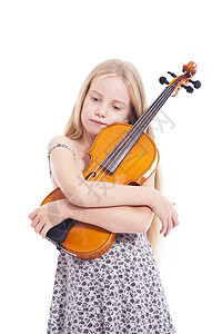 穿着服装的年轻女孩拉着小提琴音乐女性天赋艺术魅力金发女郎乐器孩子音乐会情感图片