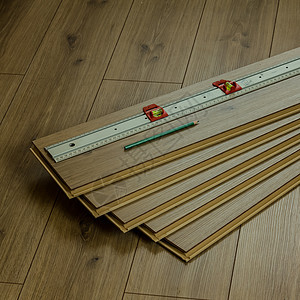 使用铅笔和仪表的橡木层地板工作木材改造控制板木头地面木地板风格压板装饰工具图片