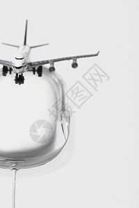 飞机拍摄Jumbo喷气式喷气机 用于苹果粉末电脑鼠标数字复合体旅行飞行飞机客机喷气白色进步速度复合想像力背景