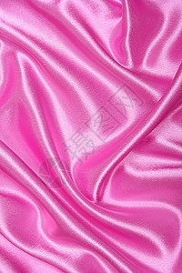 平滑优雅的粉色丝绸作为背景材料织物纺织品薰衣草曲线婚礼海浪紫丁香投标布料图片