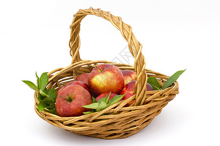 篮子中的红苹果食物叶子生态水平红色饮食果汁营养农业水果背景图片