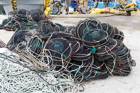 空海鲜网陷阱渔业绳索龙虾绿色螃蟹海洋工具码头渔夫钓鱼图片