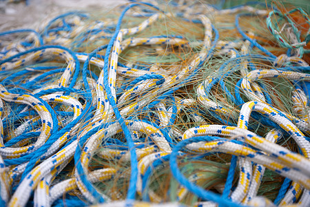 渔网和绳索详情绿色捕鱼钓鱼团体渔业蓝色设备橙子视图图片