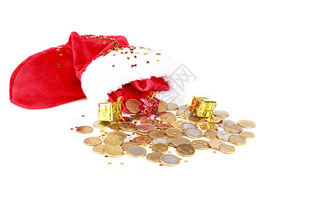圣诞老人的帽子加上欧元硬币和礼物利润展示危机金融经济危机花费购物假期经济图片
