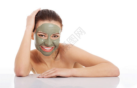 Beautifu 戴面罩的白脸女人中心面具女子沙龙成人治疗毛巾护理身体黏土图片