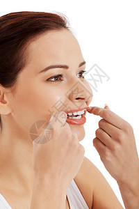 漂亮的有牙线的年轻姑娘牙齿口腔科口服肤色身体成人治疗牙科嘴唇宏观图片