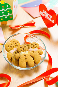 x mas 的姜饼面包男人礼物饼干假期甜点食物丝带微笑问候语图片