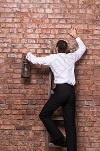人靠在砖墙上公司商务死路成就梯子石蜡灯笼挑战冒险人士图片