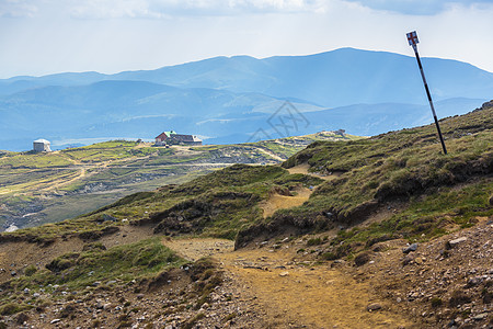 山迹蓝色地形远足地平线日光高地小路登山生态草地图片