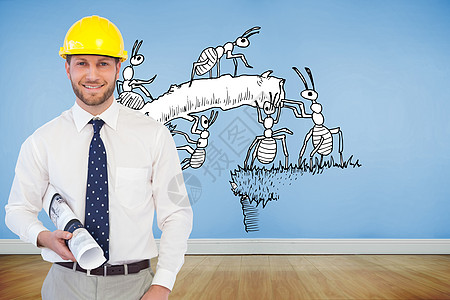 喜悦的年轻建筑师形象综合图象计算机微笑衬衫蚂蚁蓝色建造头盔职业地板房间图片