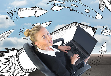 商业女商务人士用笔记本电脑坐在摇摇椅上的综合图像商务天空微笑阳光女士套装艺术绘图火箭技术图片