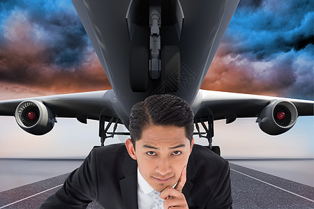 商务飞机深思熟虑的亚洲商务人士指出 在棕色假期跑道思维男人短发套装屏幕职业蓝色背景