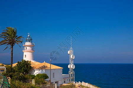 地中海海洋巴伦西亚Cullera灯塔天空天堂太阳海岸蓝色海岸线旅行假期晴天季节图片