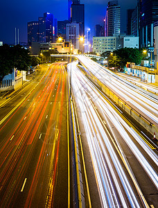 晚上在香港摩天大楼景观公共汽车运输中心高峰商业城市建筑交通图片