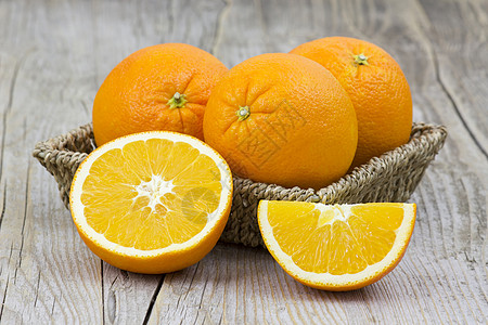 篮子里的新鲜橙子饮食宏观花园桌子食物季节水果水平热带果汁图片