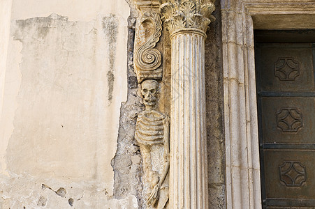 骨架石墙雕塑骨头骨骼柱子背景图片