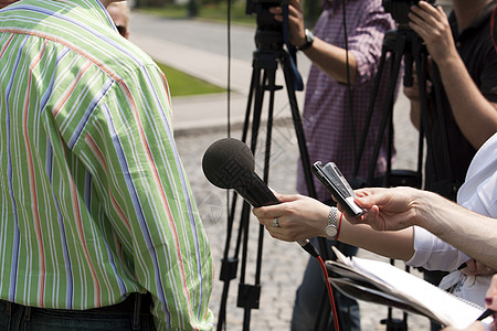 媒体采访广播人民记录相机麦克风演讲讨论视频摄影师民众图片