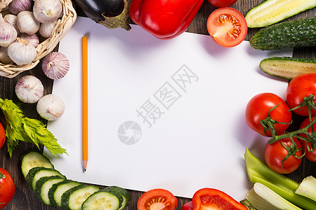 铺在纸页周围的蔬菜桌子草本植物香料厨房食物胡椒烹饪教科书笔记饮食图片
