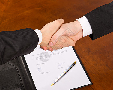 手的团队素材签署合同团队交易人士联盟商业文件夹签名男人合作合伙背景