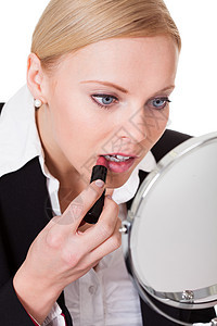 涂口红的有吸引力的女商务人士商业护理美丽女性皮肤嘴唇商务美化用品肤色背景图片