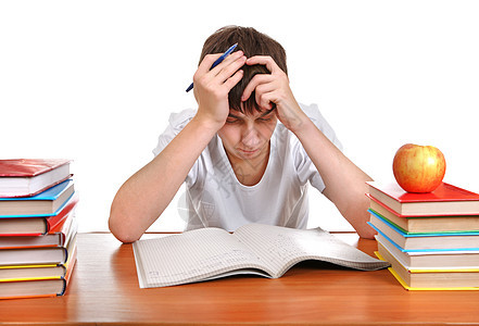 忧伤的 疲倦的学生身体家庭作业男性厌倦图书教育学校青少年青年教科书图片