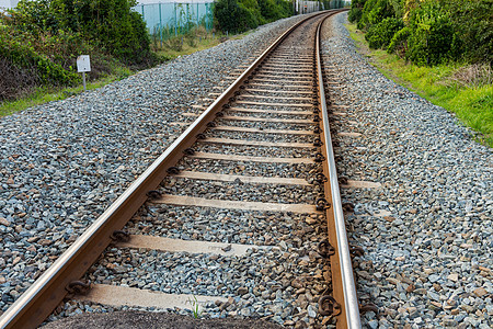 铁路铁轨植物危险石头岩石卵石安全运输驾驶曲线路口图片