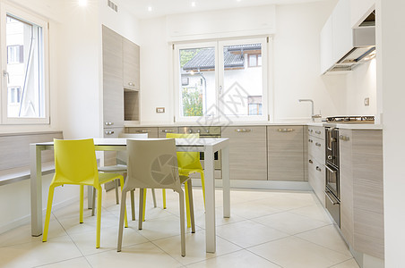 现代厨房内财产建筑学木头地面窗户桌子玻璃器具台面房间图片