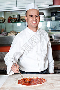 做披萨的笑脸厨师烹饪商业美食食谱传播职业厨房职员服务餐厅图片