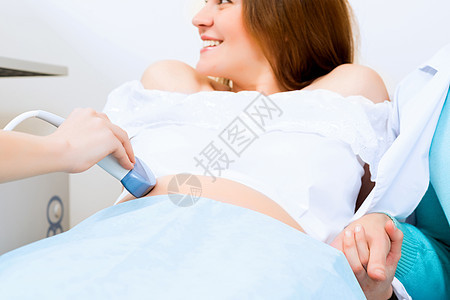 和腹部超声波扫描仪检查家庭成人说谎女性卫生考试控制母亲保健图片