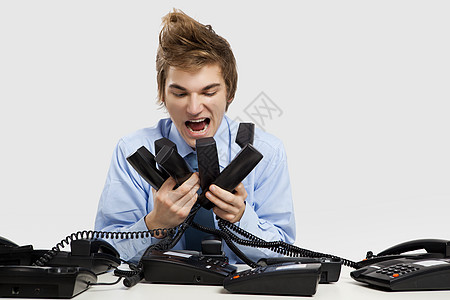 应答电话求助顾问尖叫商务商业超载呼叫人士工作桌子图片
