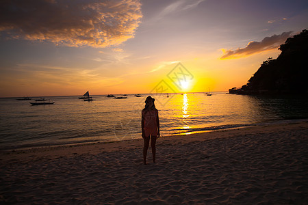 菲律宾博拉凯岛多彩明亮的日落阳光旅行血管支撑海洋海滩旅游海浪海岸太阳图片