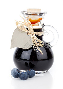 玻璃瓶或混合物中的蓝莓糖浆 有心脏标签玻璃甜蜜瓶子味道配料覆盆子甜点甘蔗食物液体图片