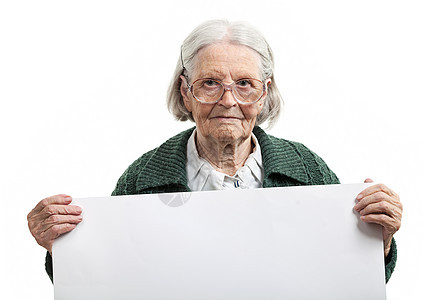 手拿着空白纸的幸福年长女士相机照片微笑眼镜养老金老年退休快乐眼睛女性图片