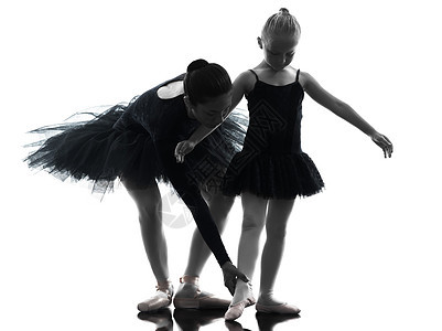 女人和小女孩芭蕾舞女演员芭蕾舞演员跳舞 silhouett白色黑天鹅老师黑色女性青年短裙教育孩子两个人图片
