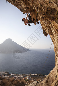 日落时的攀岩者风景运动天空成人太阳绳索挑战岩石男人男性图片