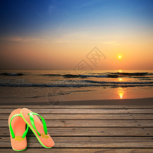 木制背景桌子天空码头假期橙子阳光拖鞋地面热带太阳图片