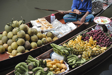 泰国传统浮动市场果实的销售情况情调热带水果运输女士蔬菜旅游贸易生产运河图片