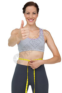 长腰健壮 大拇指伸直的身材适合的妇女图片