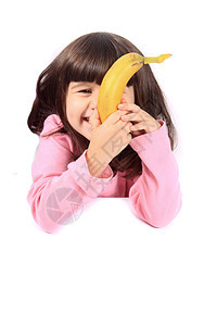 女孩吃香蕉的小女孩食物女性小吃青少年微笑水果孩子黑发图片