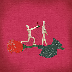 红玫瑰 布料背景有缝合风格庆典花瓣手工尼龙接缝电脑礼物植物创造力花束图片