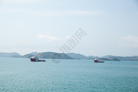 一般货船商业地平线血管送货货运港口船运日落海岸工艺图片