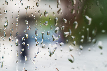 窗户上的雨水滴     有选择性的焦点液体宏观湿度流动飞沫水滴雨滴滴水水分环境图片