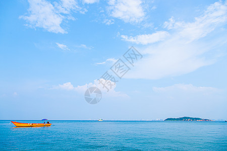 海滩和海太阳假期天堂爬坡游客海洋热带蓝色风景海岸图片