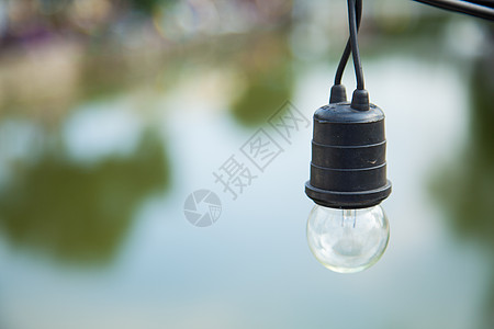 小灯泡活力玻璃气体金属黑色白色技术辉光创造力力量背景图片